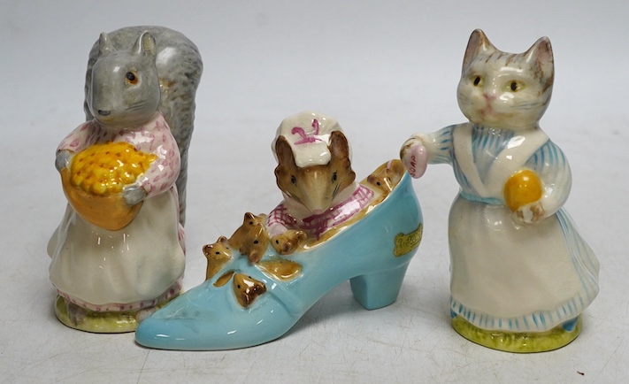 Eleven Beatrix Potter figures to include Duchess with flowers, tallest 11cm. Condition - good